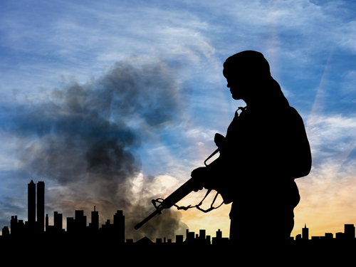 テロの街で銃を持つ人のイメージ画像